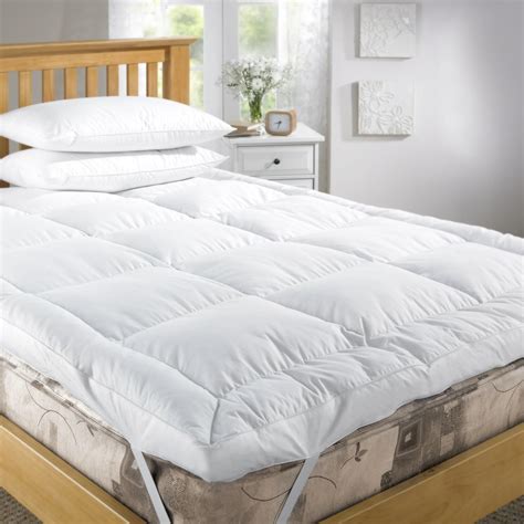 Feather mattress topper - The Granny Goose Featherbed adds a layer of comfort to your mattress without compromising on back support. It cushions all your pressure points while you ...